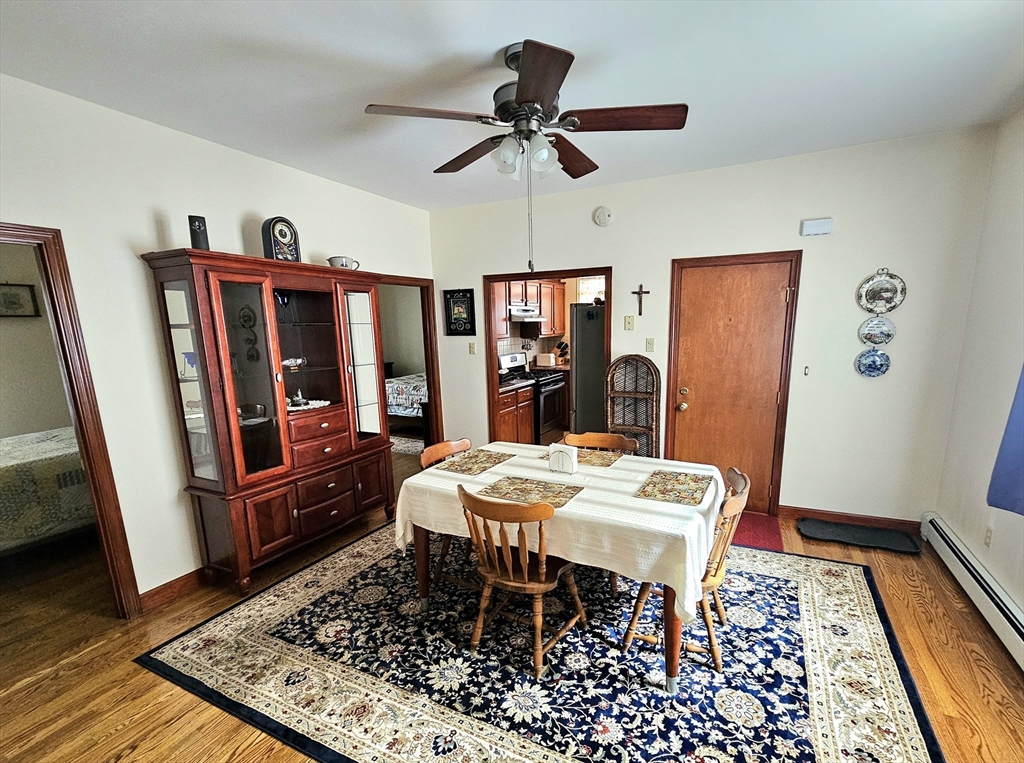 460 William Street Fall River, MA 02721 - Photo 7 of 23 a view of a dining room with furniture window and wooden floor