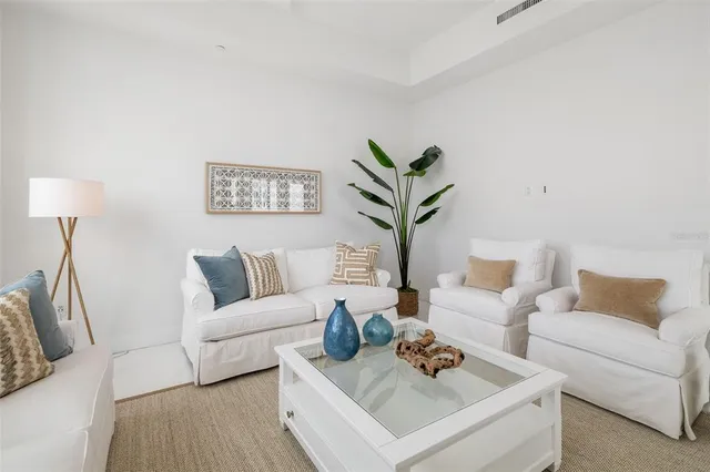 a bathroom with a shower and a glass door
