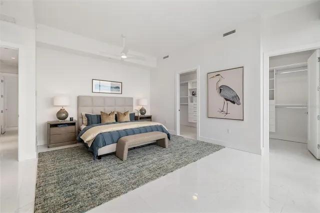 a bathroom with a double vanity sink mirror and
