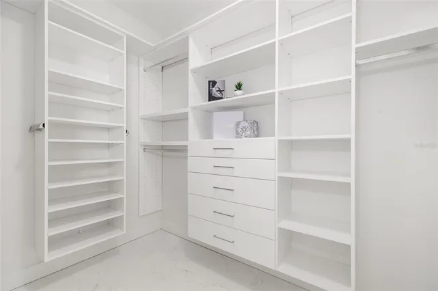 an aerial view of a houses with outdoor space