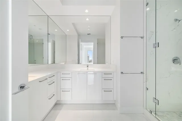 a view of a livingroom with furniture and a potted plant