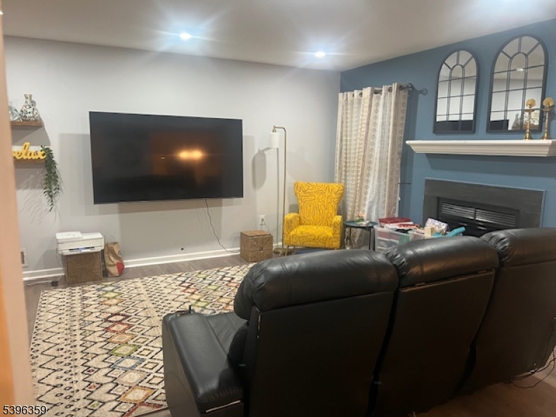 199 Hyde Park Road Somerset, NJ 08873 - Photo 3 of 17 a living room with furniture and a flat screen tv