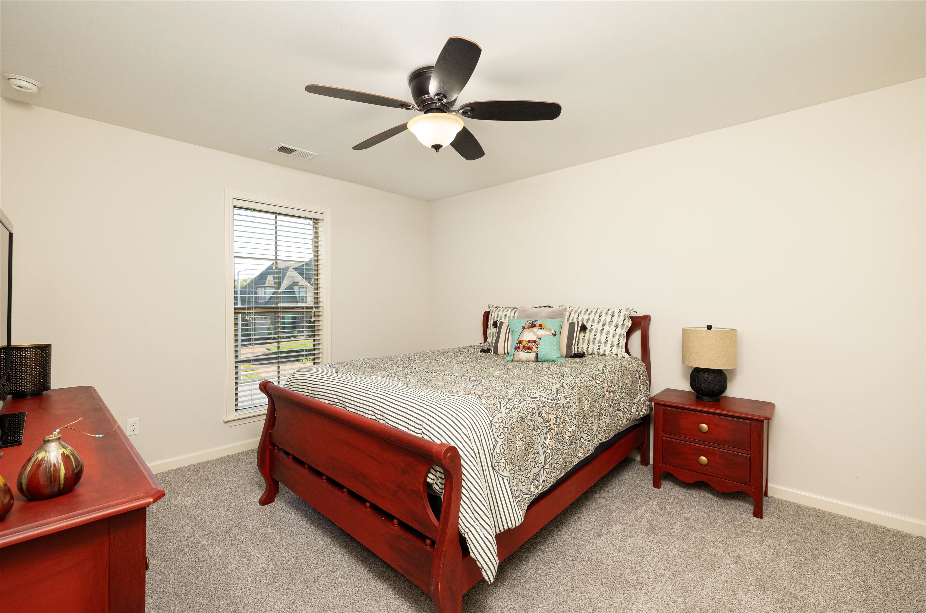 226 Estanaula Road Collierville, TN 38017 - Photo 18 of 32 a bedroom with a bed and window