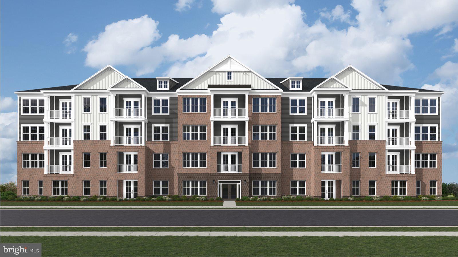 4003 Seaside Alder Road, Unit 203 Bowie, MD 20720 - Photo 1 of 22 a view of a big yard in front of a building