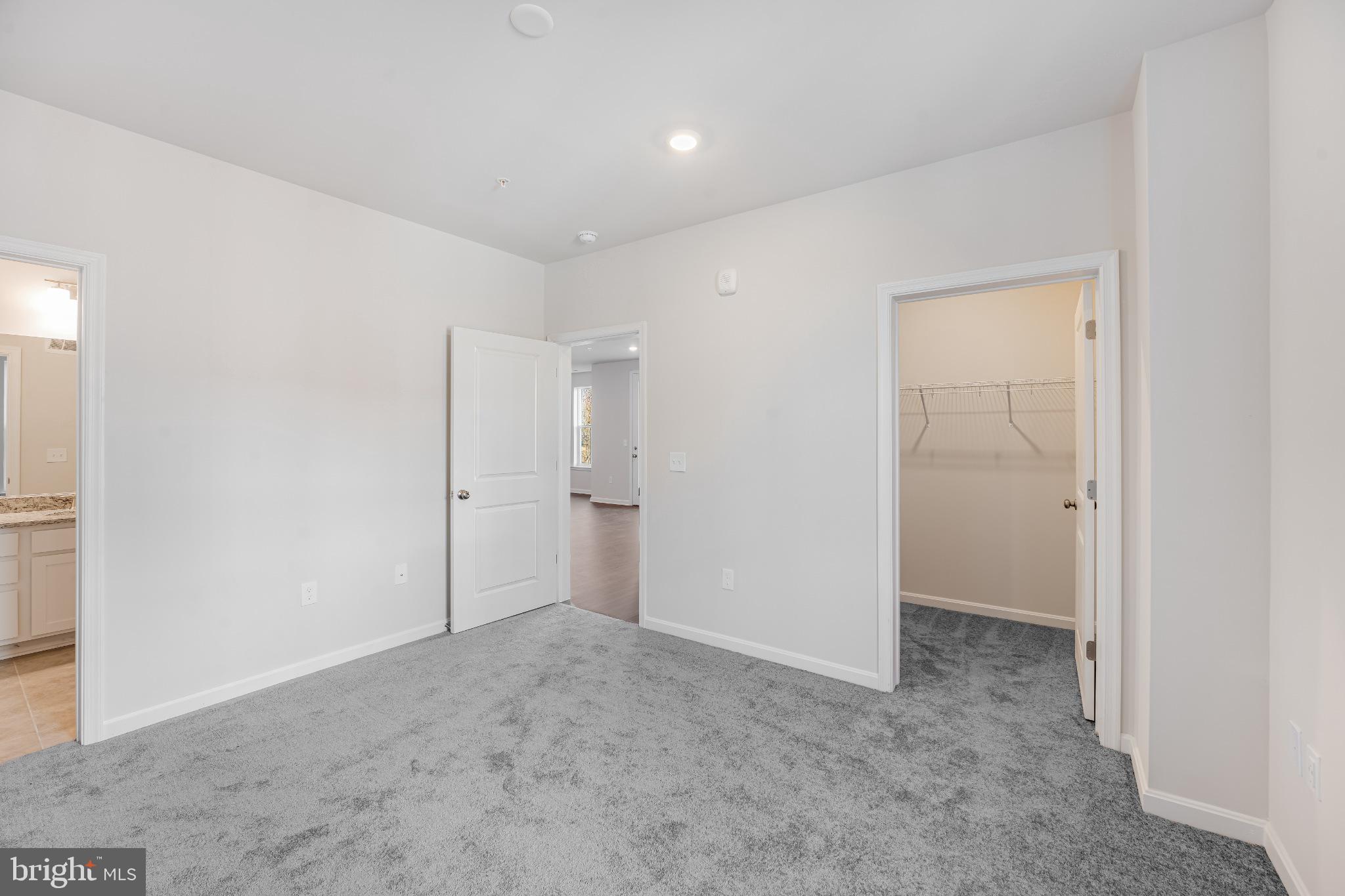 4003 Seaside Alder Road, Unit 203 Bowie, MD 20720 - Photo 18 of 22 a view of an empty room