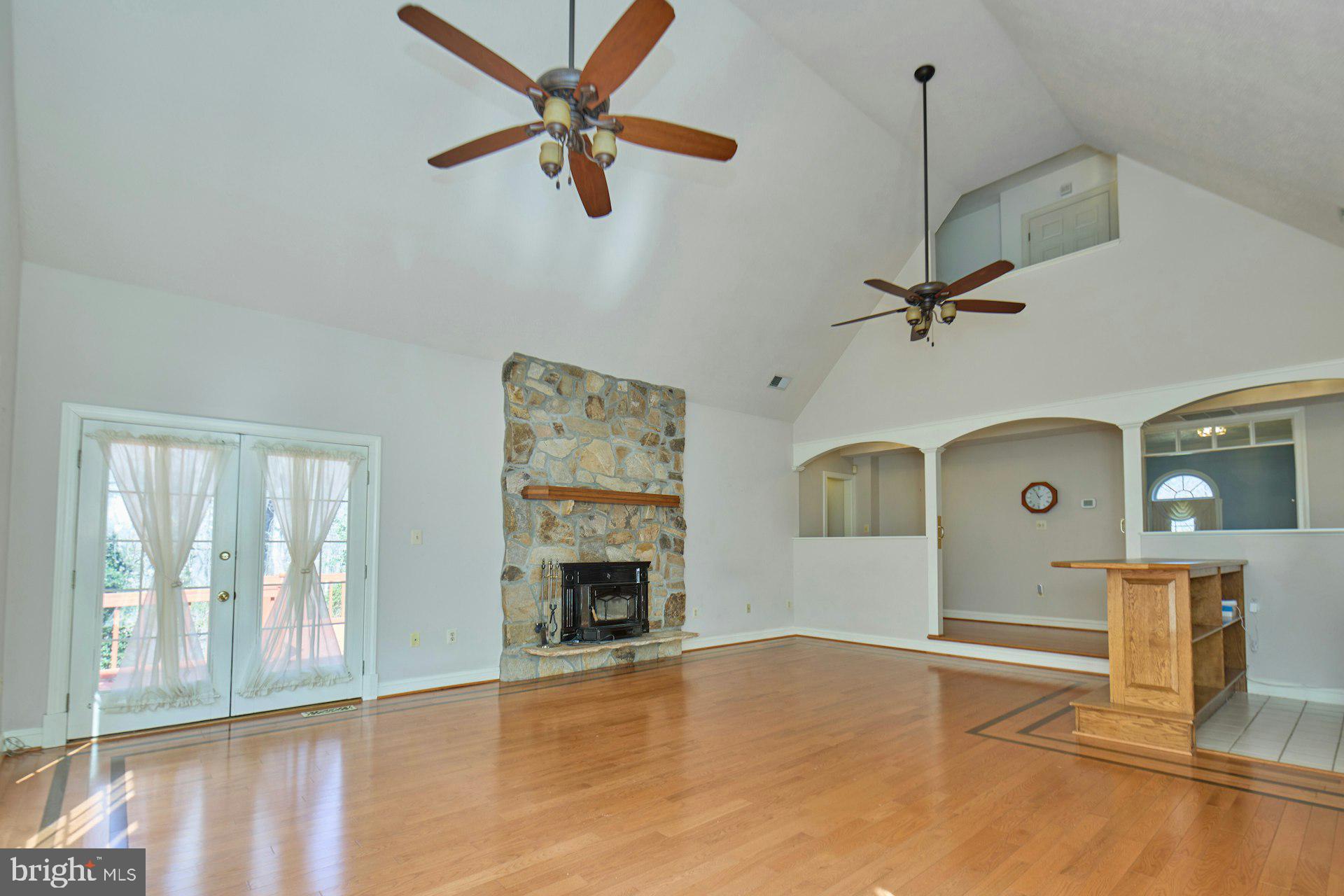 6051 Adams Drive La Plata, MD 20646 - Photo 12 of 72 a view of empty room with wooden floor and fan
