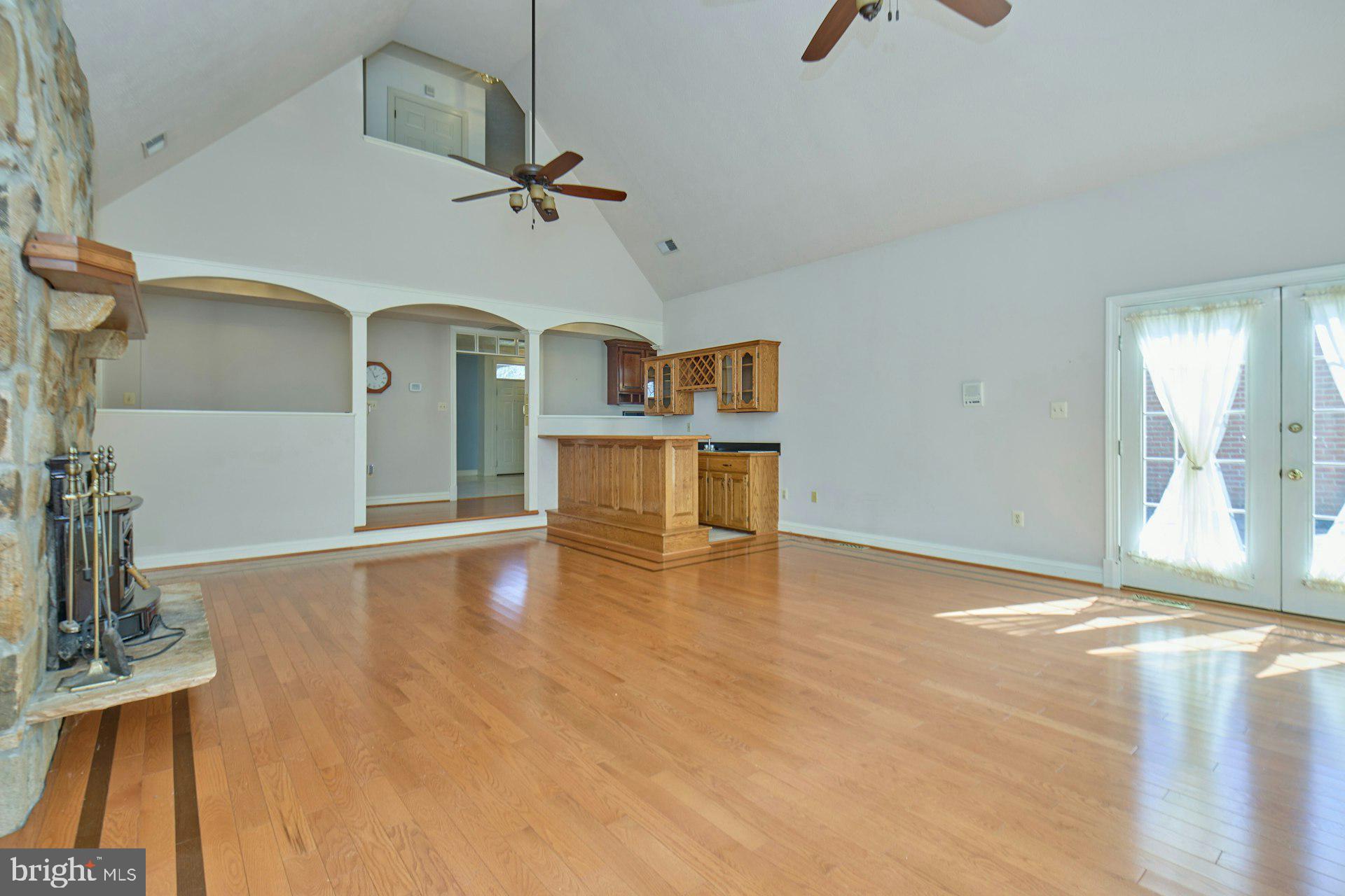 6051 Adams Drive La Plata, MD 20646 - Photo 13 of 72 a view of a kitchen with a sink hardwood floor and a view of living room
