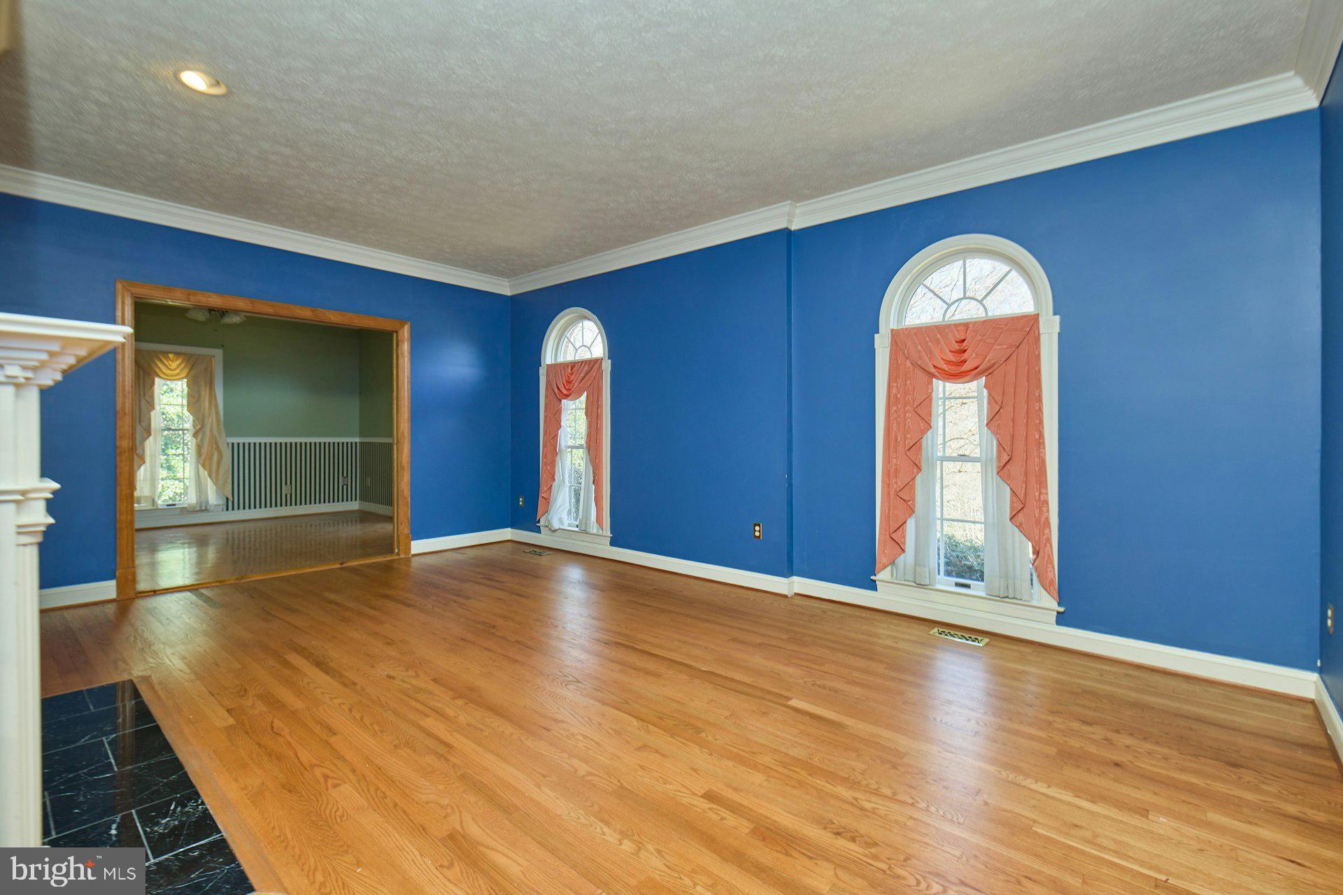 6051 Adams Drive La Plata, MD 20646 - Photo 22 of 72 a view of an empty room with window and wooden floor