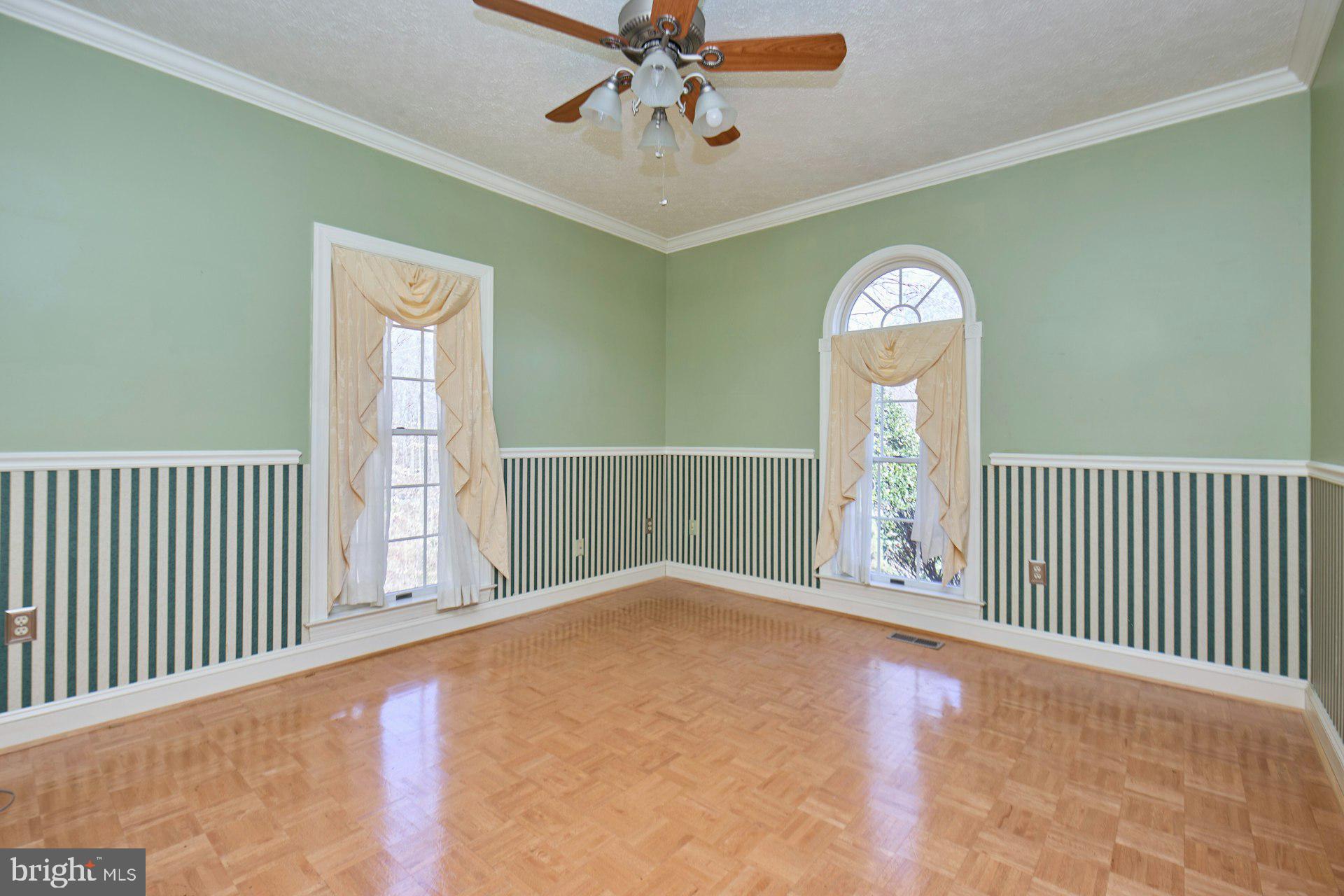 6051 Adams Drive La Plata, MD 20646 - Photo 25 of 72 a view of empty room with a window and wooden floor