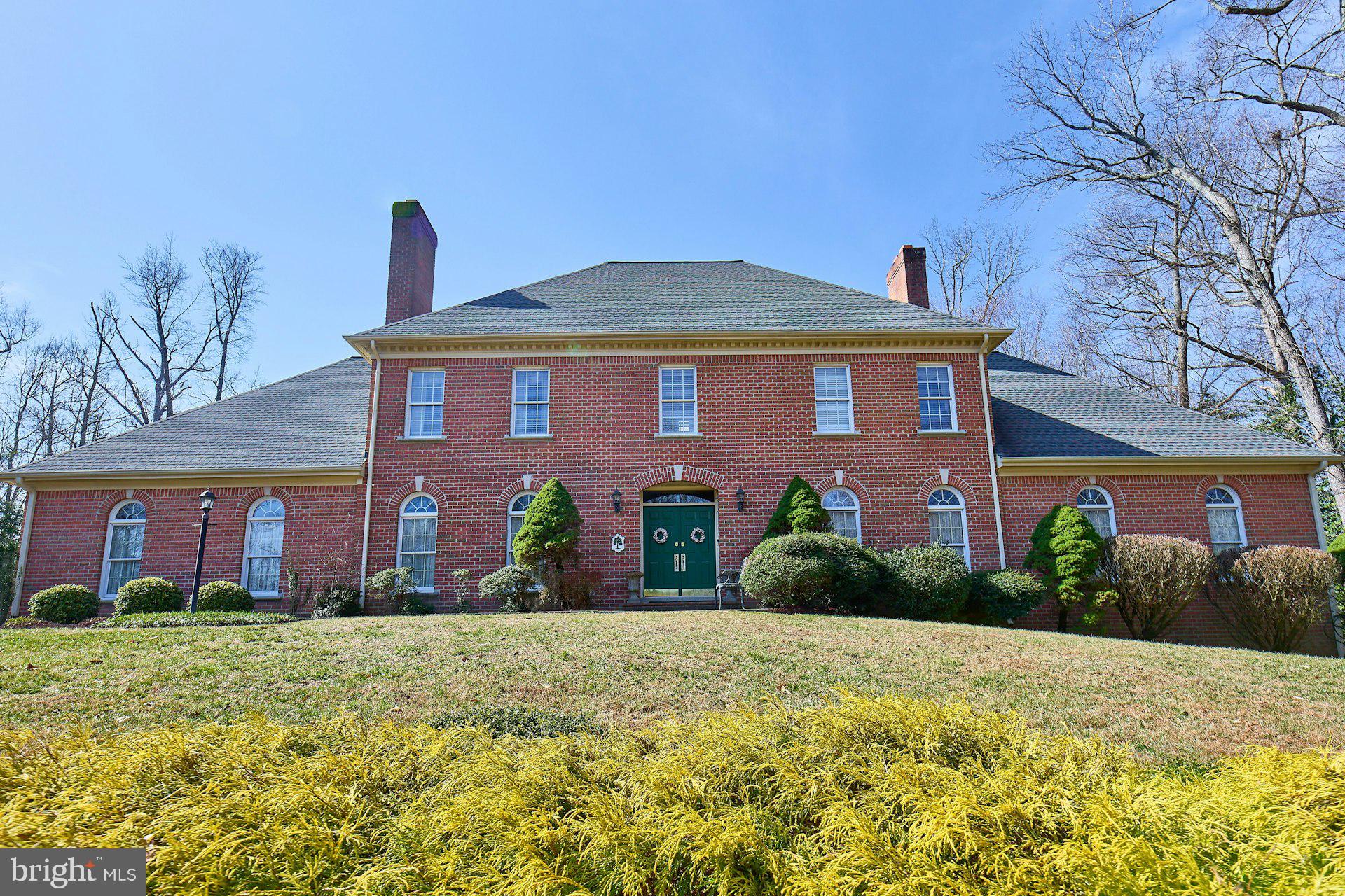 6051 Adams Drive La Plata, MD 20646 - Photo 5 of 72 a front view of a house with a yard