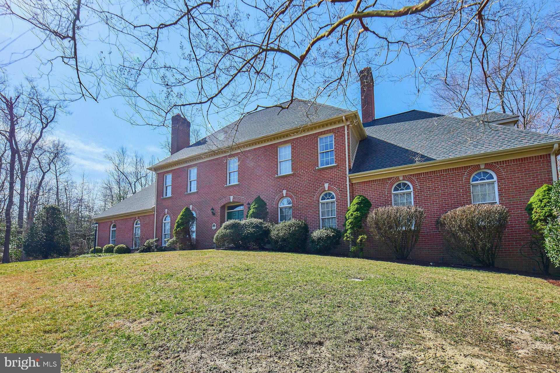 6051 Adams Drive La Plata, MD 20646 - Photo 6 of 72 a front view of a house with a yard