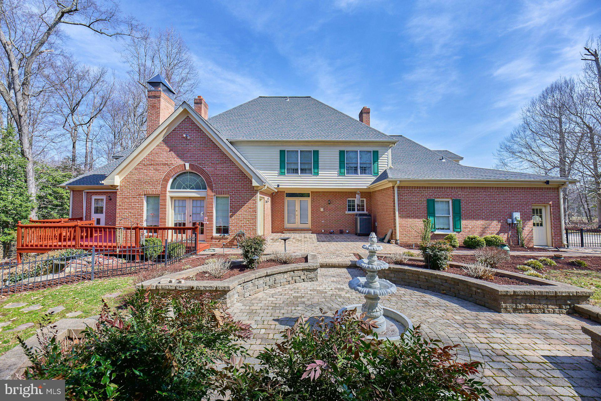 6051 Adams Drive La Plata, MD 20646 - Photo 68 of 72 a front view of a house with garden and sitting area