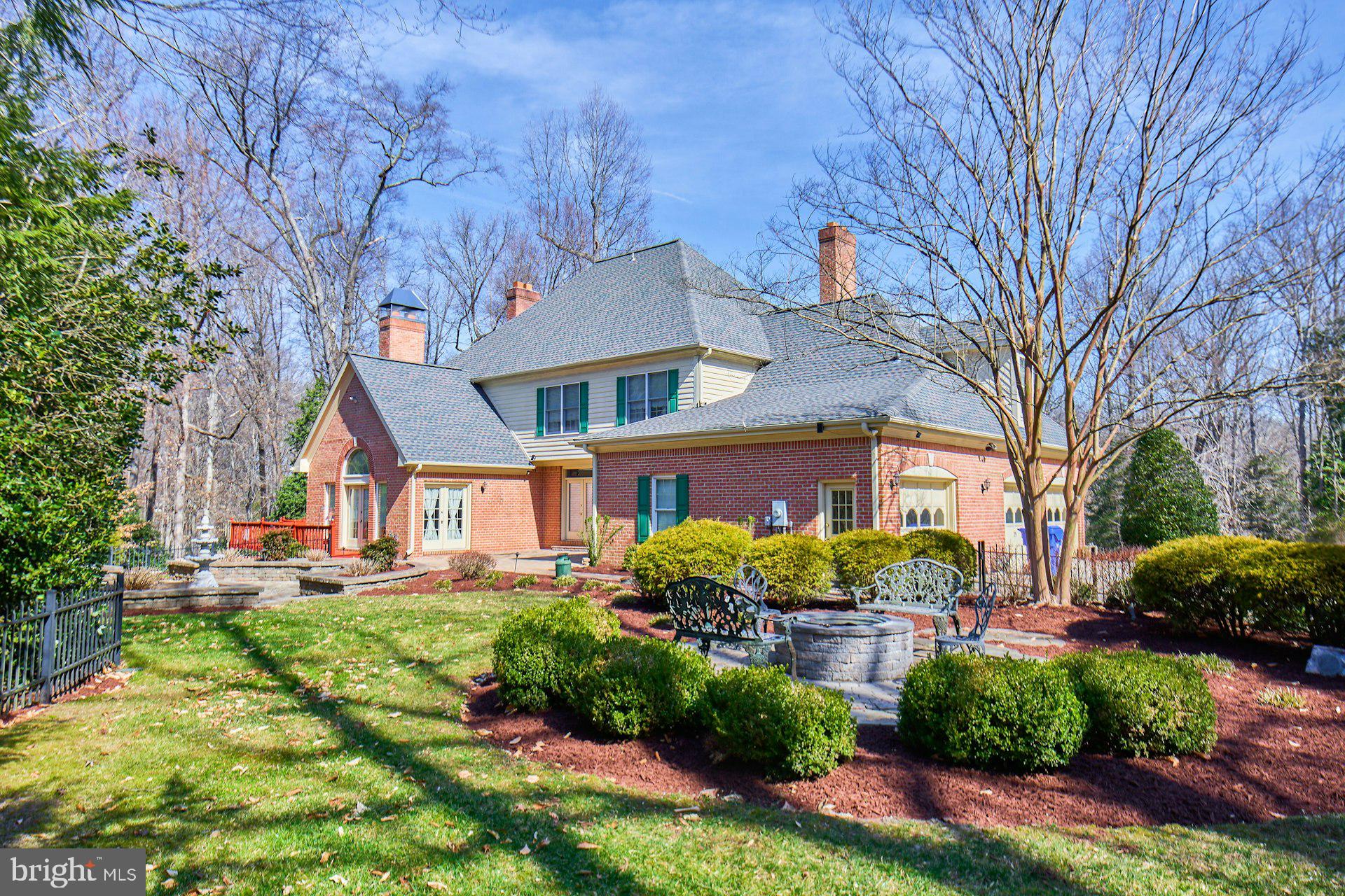 6051 Adams Drive La Plata, MD 20646 - Photo 69 of 72 a front view of a house with a yard and outdoor seating