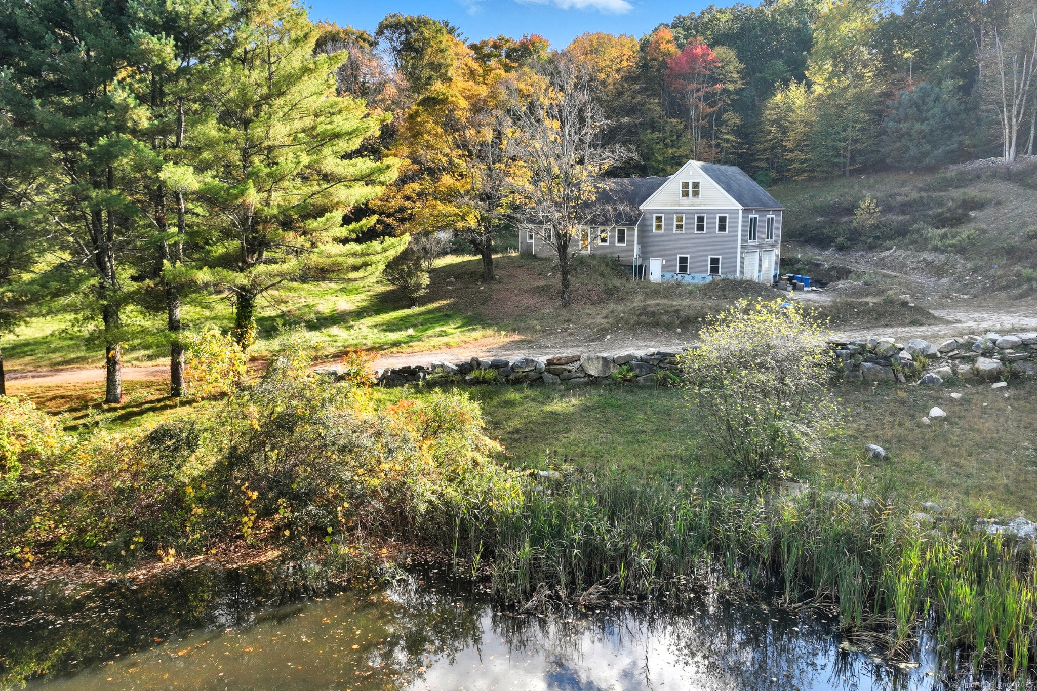 a view of a house with a yard