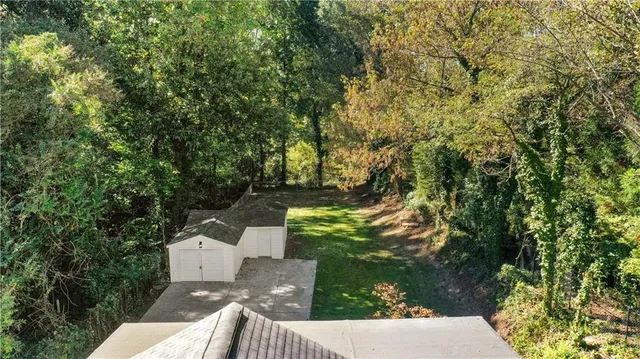 a view of yard from balcony