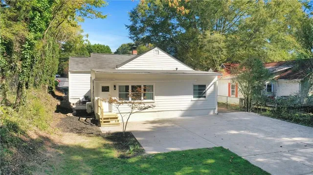 front view of a house with a yard