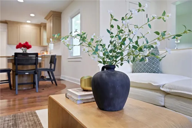a kitchen with a table and chairs in it