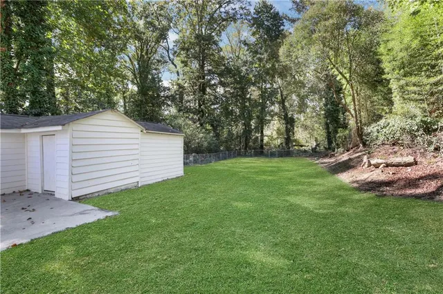 a view of a backyard with a garden