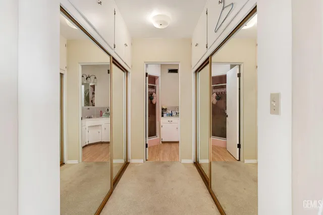 a view of a livingroom with furniture and a window