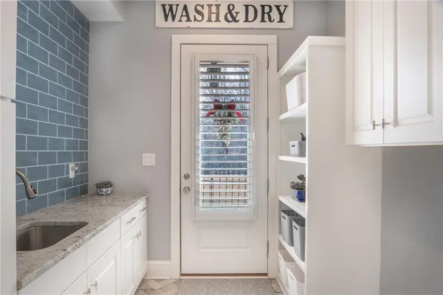 a view of kitchen and utility room