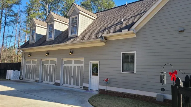 a view of a house with a garage