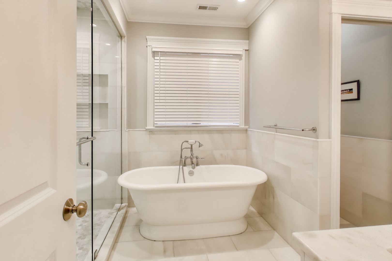 1226 West Henderson Street Chicago, IL 60657 - Photo 13 of 32 a white bath tub sitting next to a white sink