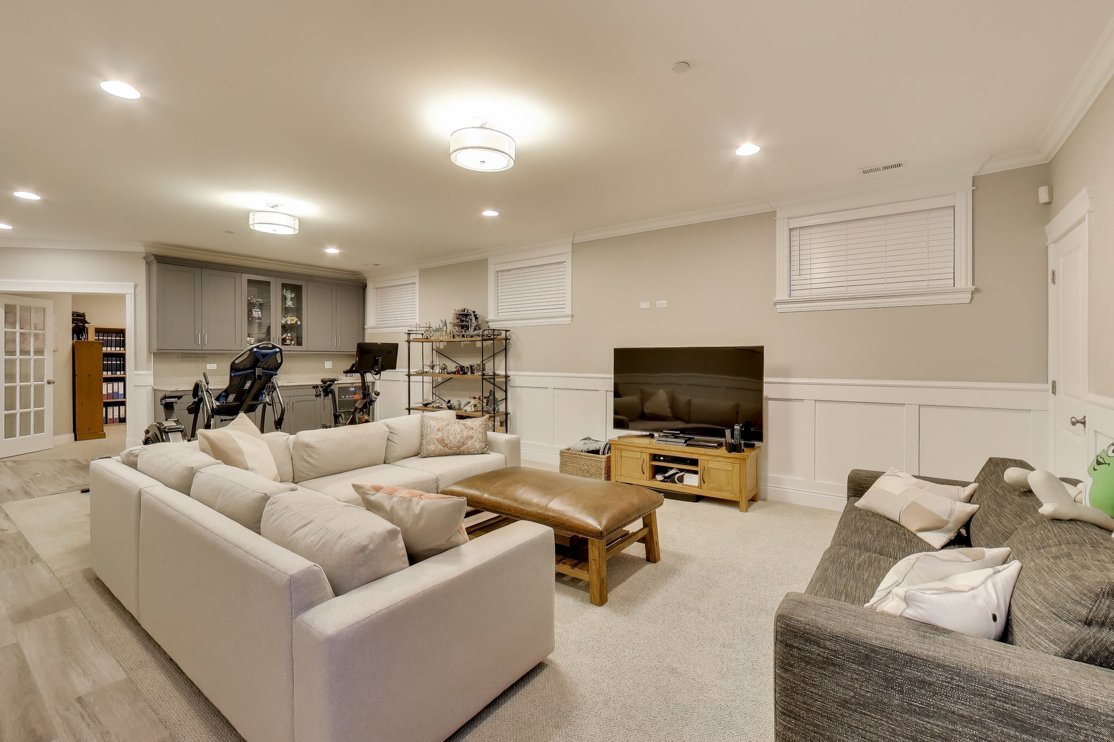 1226 West Henderson Street Chicago, IL 60657 - Photo 17 of 32 a living room with furniture and a flat screen tv