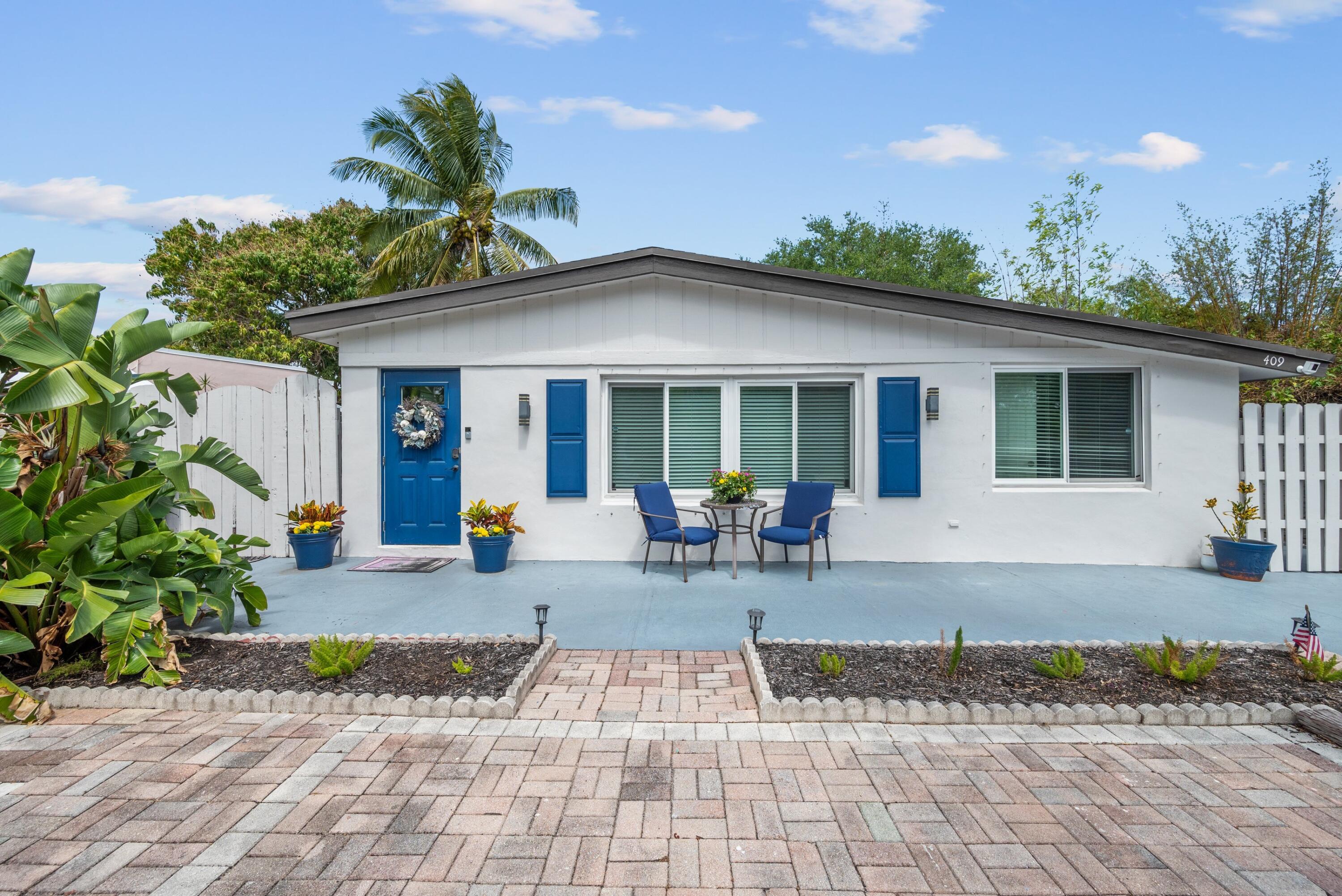 409 Manchester Street Boca Raton, FL 33487 - Photo 2 of 32 Front Exterior