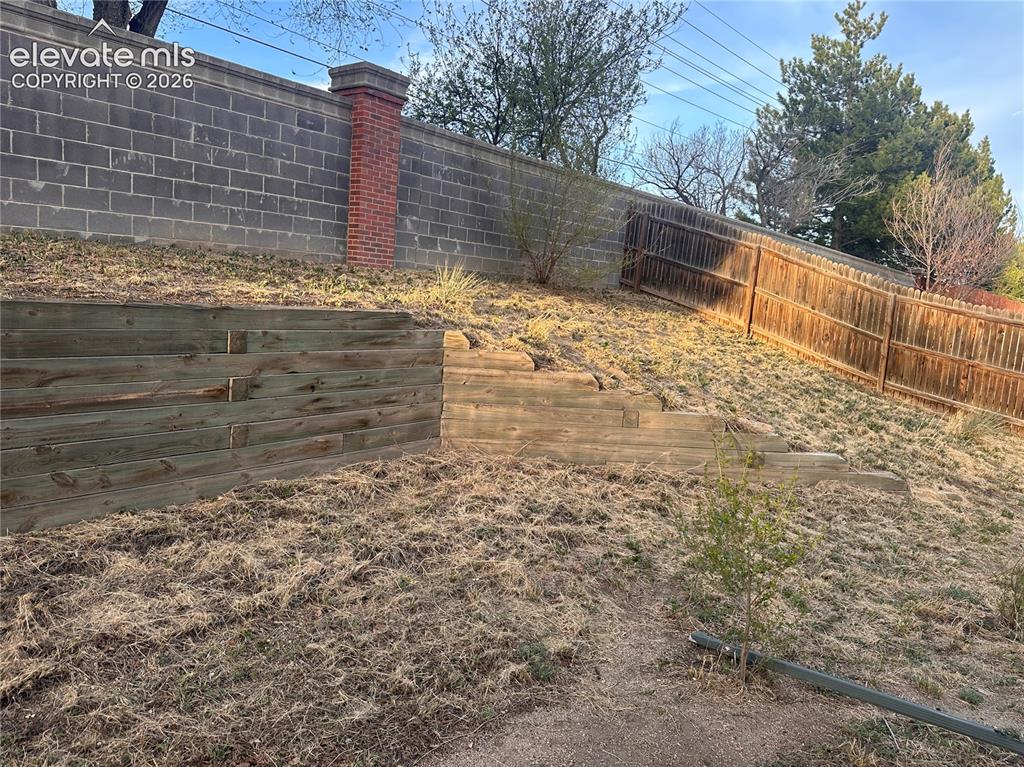 628 Prairie Star Circle Colorado Springs, CO 80916 - Photo 34 of 37 Backyard is terraced