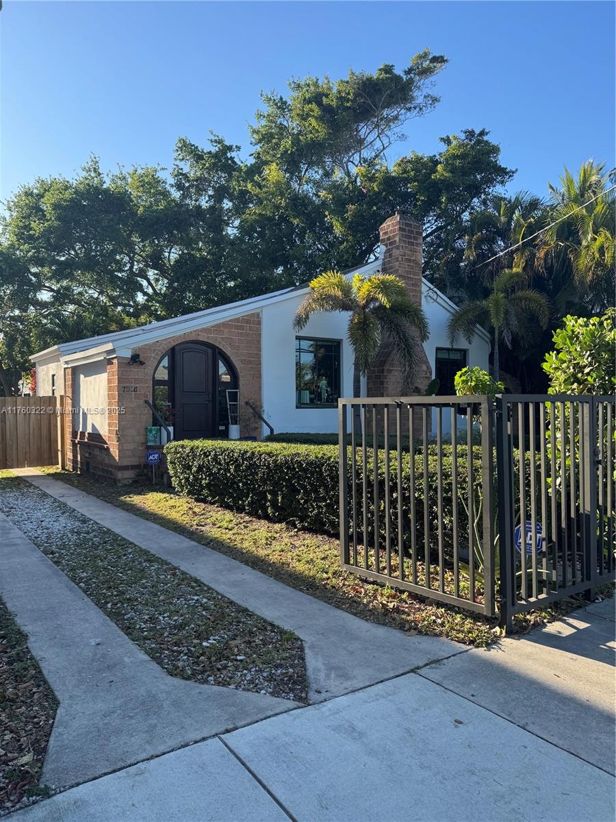 7020 Northeast 5th Avenue Miami, FL 33138 - Photo 23 of 42 a front view of house with small garden in front of it