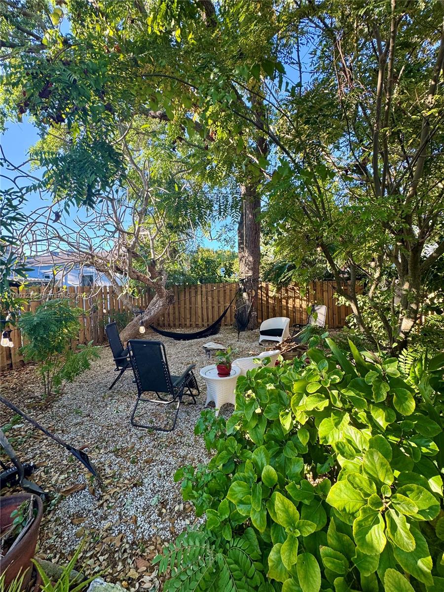 7020 Northeast 5th Avenue Miami, FL 33138 - Photo 26 of 42 a garden view with a seating space