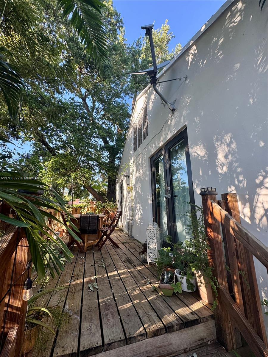 7020 Northeast 5th Avenue Miami, FL 33138 - Photo 28 of 42 a view of a house with backyard and sitting area