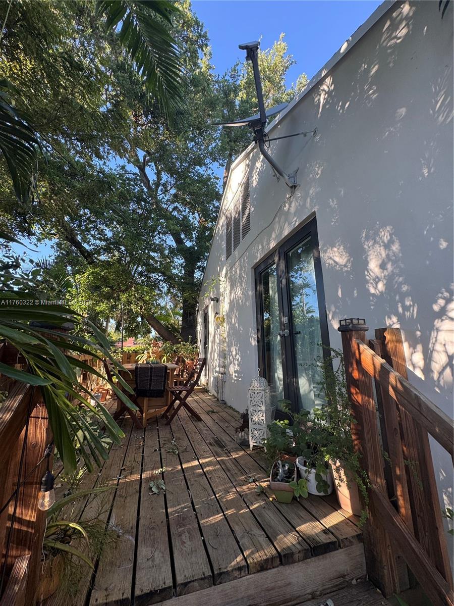 7020 Northeast 5th Avenue Miami, FL 33138 - Photo 29 of 42 a view of a house with backyard and sitting area