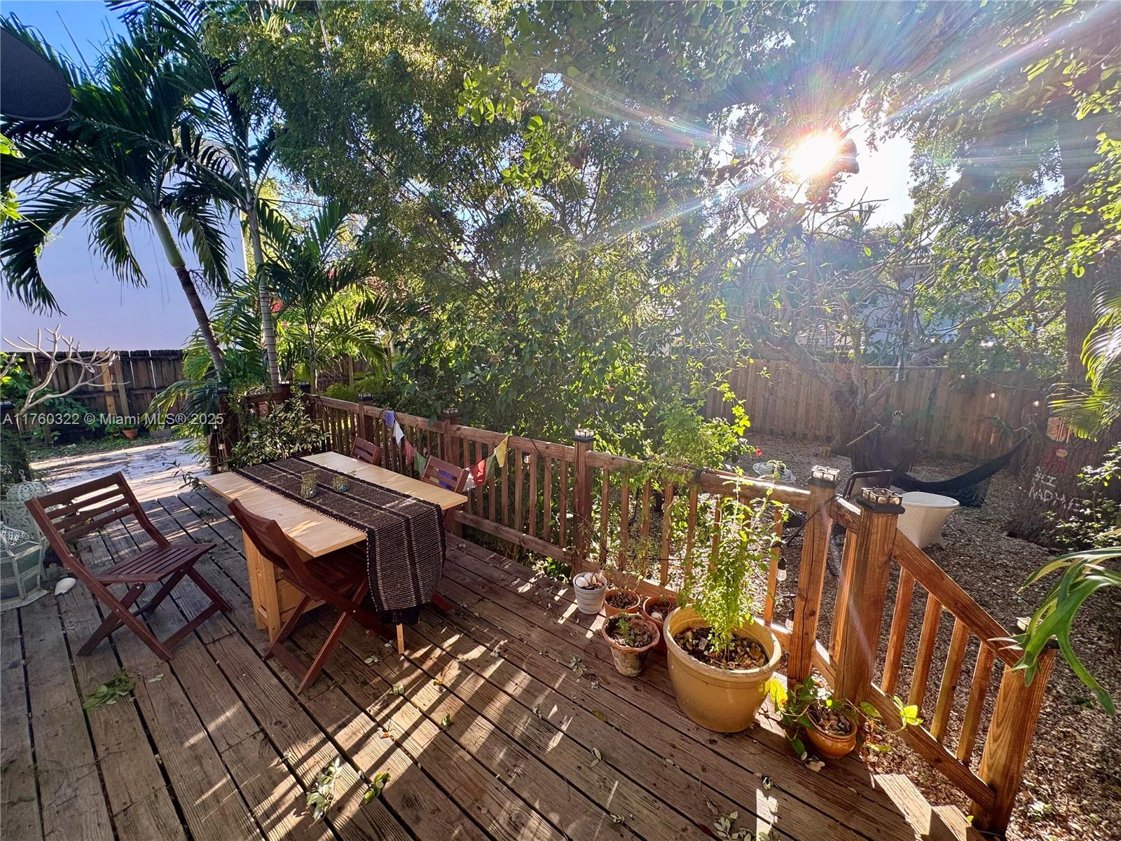 7020 Northeast 5th Avenue Miami, FL 33138 - Photo 33 of 42 a view of a backyard with sitting area