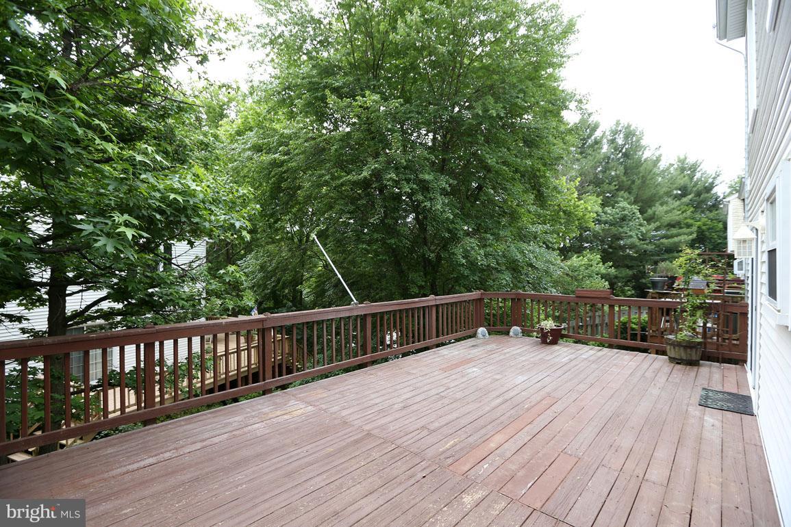 1725 Logmill Lane Gaithersburg, MD 20879 - Photo 13 of 30 a view of a balcony with wooden floor