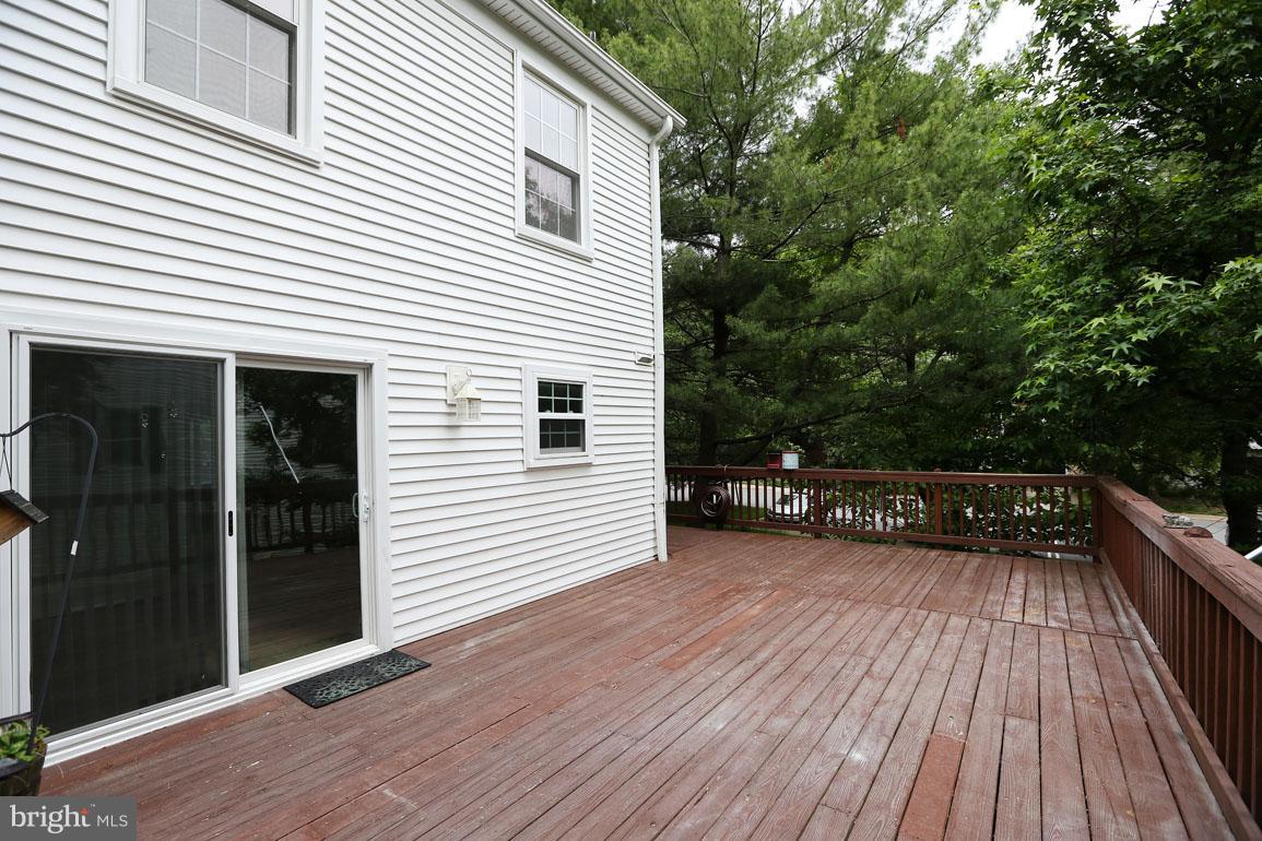 1725 Logmill Lane Gaithersburg, MD 20879 - Photo 15 of 30 a view of a house with a deck