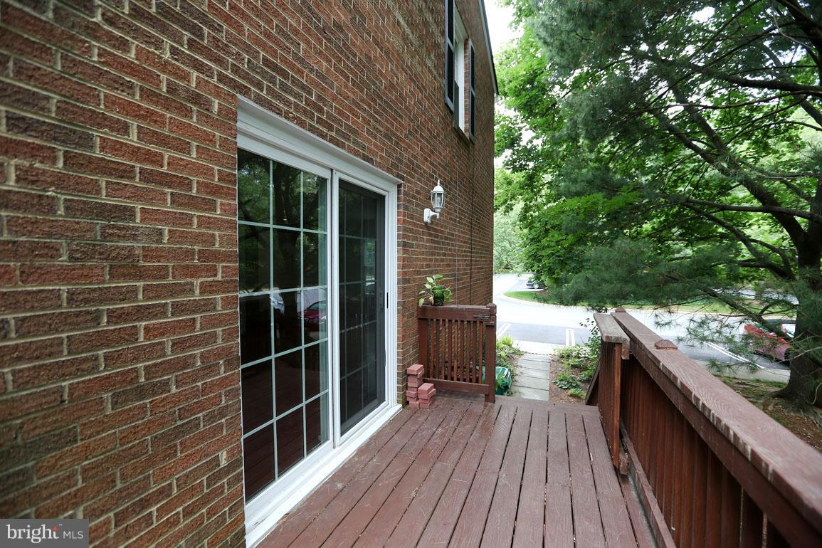 1725 Logmill Lane Gaithersburg, MD 20879 - Photo 16 of 30 a view of balcony with wooden floor and outdoor space