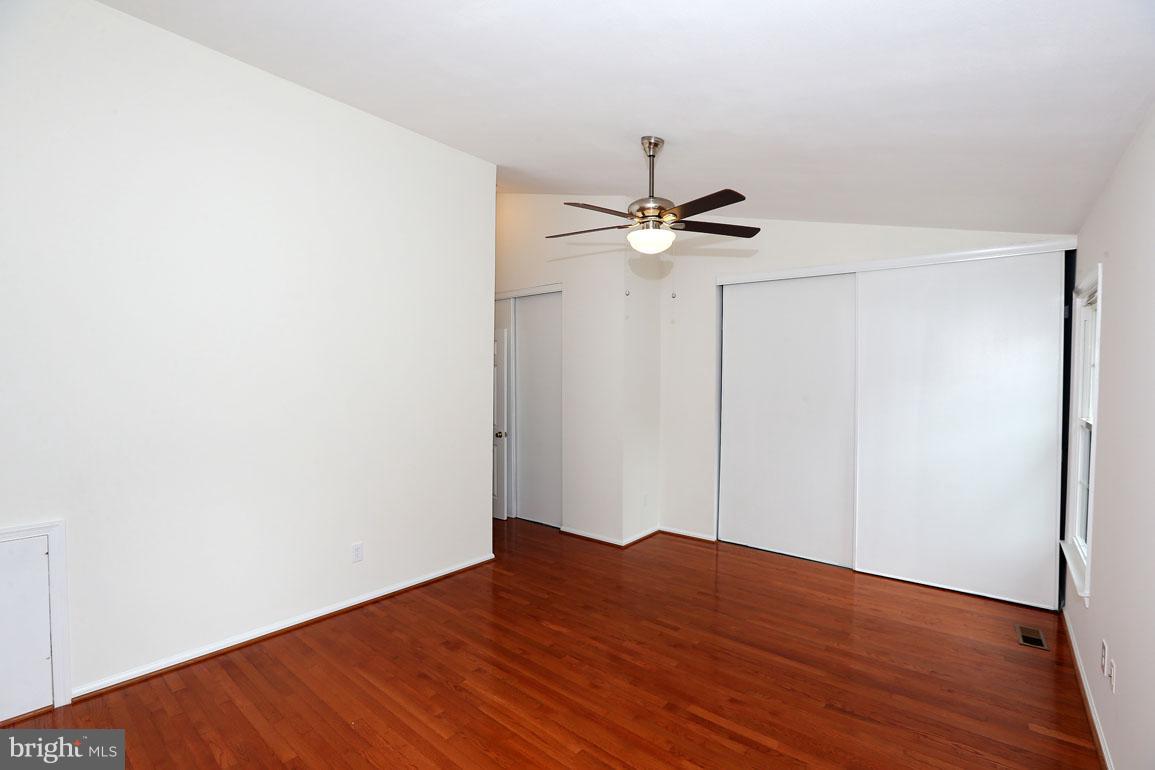1725 Logmill Lane Gaithersburg, MD 20879 - Photo 19 of 30 a view of a big room with wooden floor