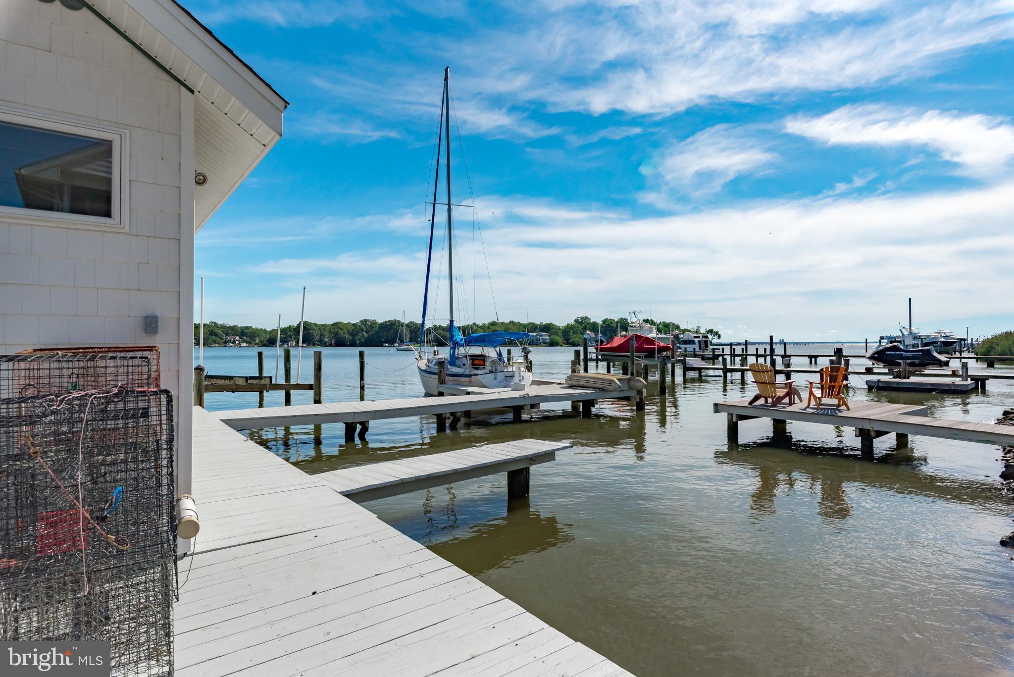 3731 Thomas Point Road Annapolis, MD 21403 - Photo 82 of 90 The boat house has multiple finger piers and lifts
