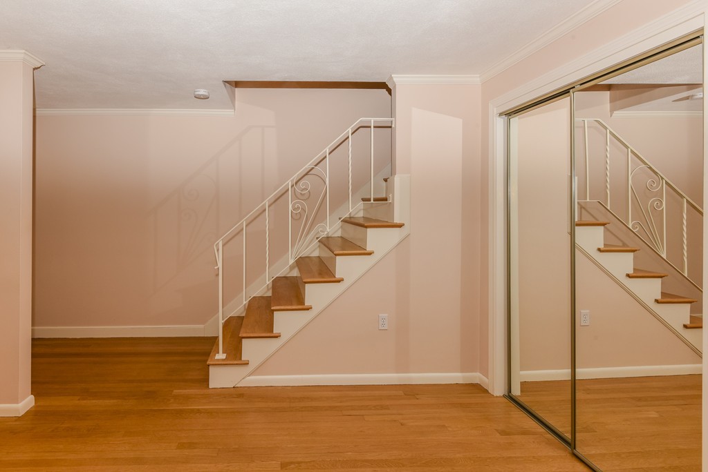36 Clough Road, Unit 36 Dedham, MA 02026 - Photo 4 of 19 a view of entryway with wooden floor