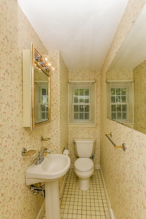 36 Clough Road, Unit 36 Dedham, MA 02026 - Photo 8 of 19 a bathroom with a sink toilet and shower