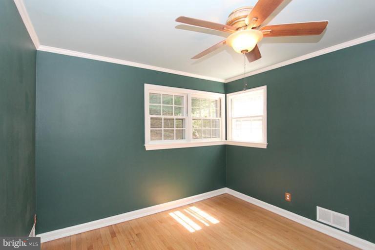 104 Parkside Road Silver Spring, MD 20910 - Photo 2 of 13 a view of an empty room with a window