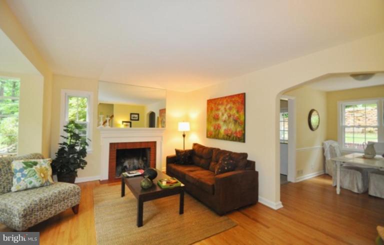 104 Parkside Road Silver Spring, MD 20910 - Photo 11 of 13 a living room with furniture and a fireplace