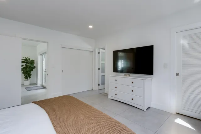 a room with furniture and a window