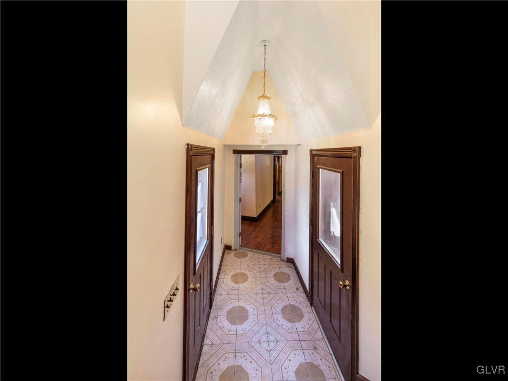 199 Evergreen Hollow Road Effort, PA 18330 - Photo 14 of 50 a view of a hallway with wooden floor and a bathroom