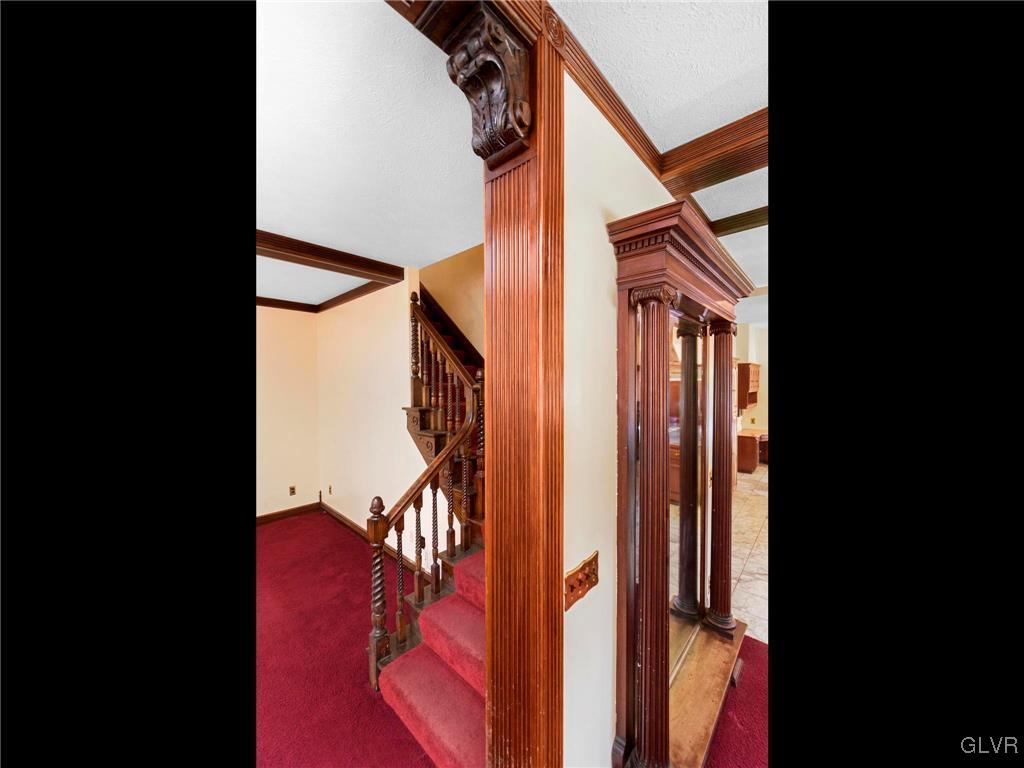 199 Evergreen Hollow Road Effort, PA 18330 - Photo 19 of 50 a view of a hallway with wooden floor and staircase