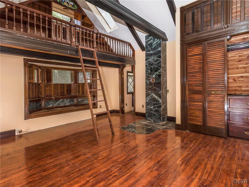 199 Evergreen Hollow Road Effort, PA 18330 - Photo 29 of 50 an entryway of a house with wooden floor