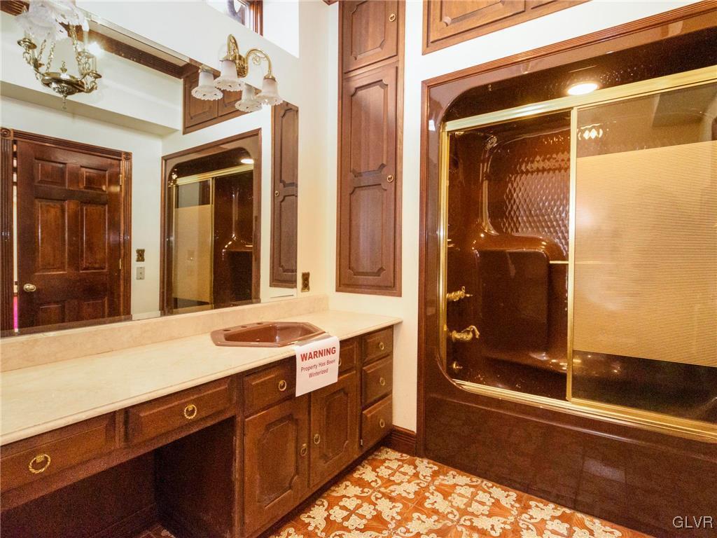 199 Evergreen Hollow Road Effort, PA 18330 - Photo 35 of 50 a bathroom with a sink and a mirror