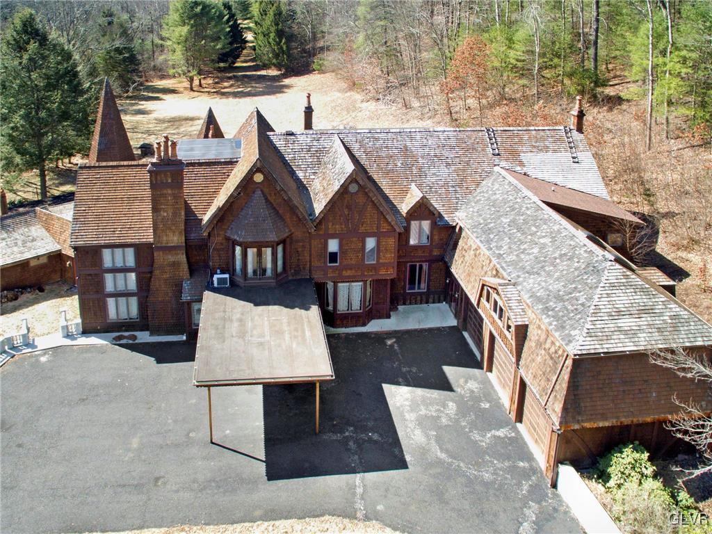 199 Evergreen Hollow Road Effort, PA 18330 - Photo 4 of 50 an aerial view of a house with large trees