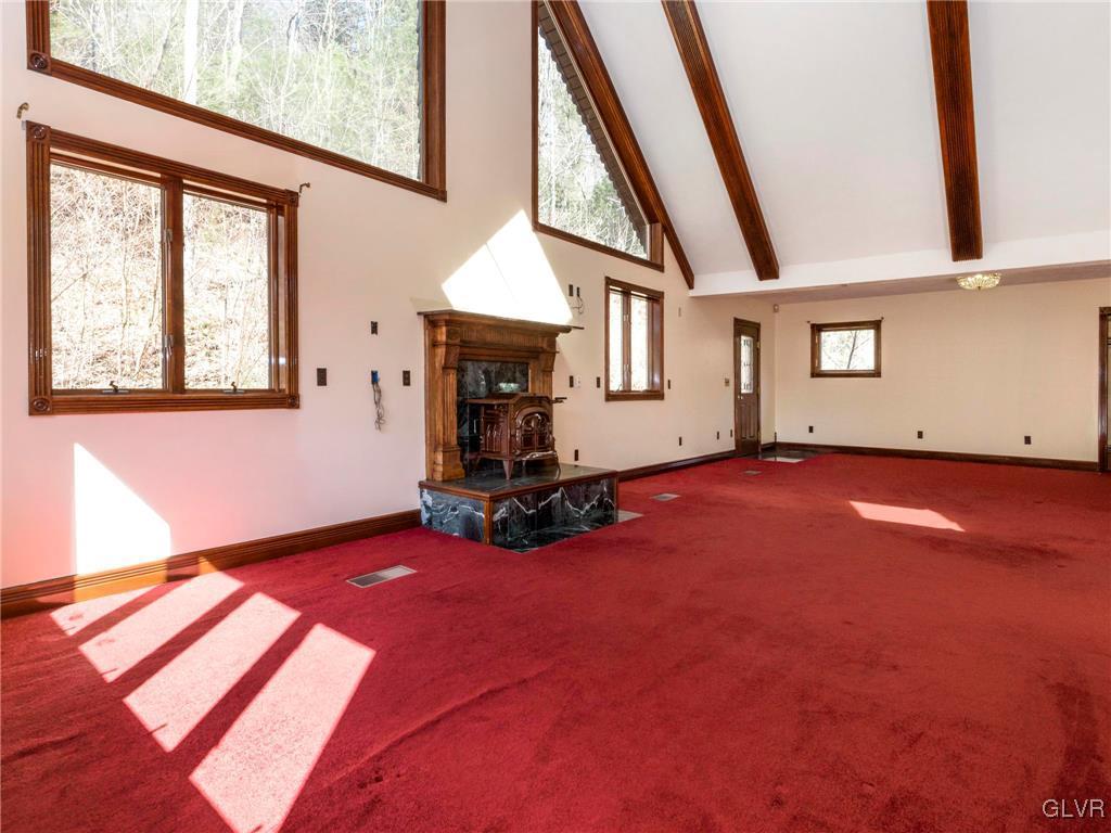 199 Evergreen Hollow Road Effort, PA 18330 - Photo 41 of 50 a view of an empty room with windows